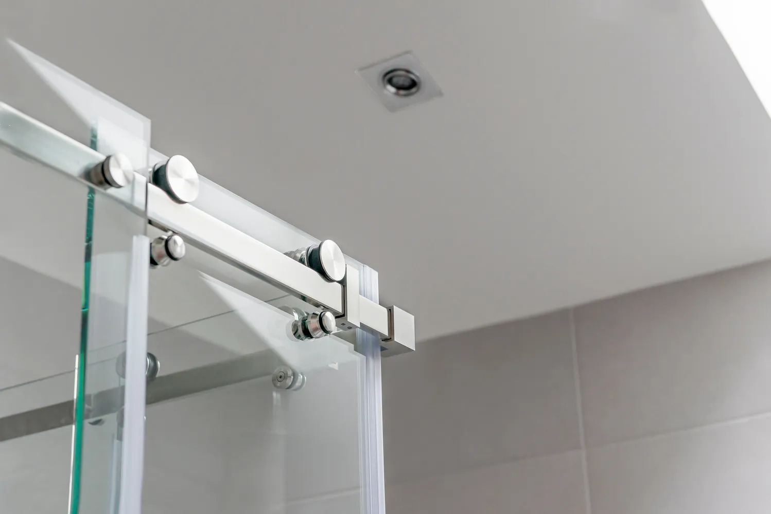 Tempered glass shower door option from IMAGO Glass Inc, a glass contractor Chicago homeowners hire for custom glass